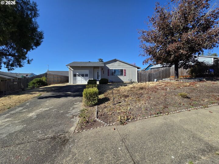 Property Photo:  410 NW Elizabeth Ave  OR 97496 