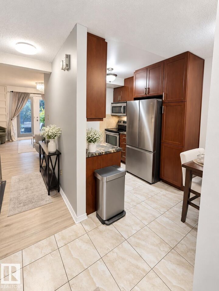 Property Photo:  12034 25 Ave NW  AB T6J 4L3 