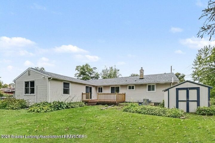 Property Photo:  117 Woodhaven Drive  MI 48917 