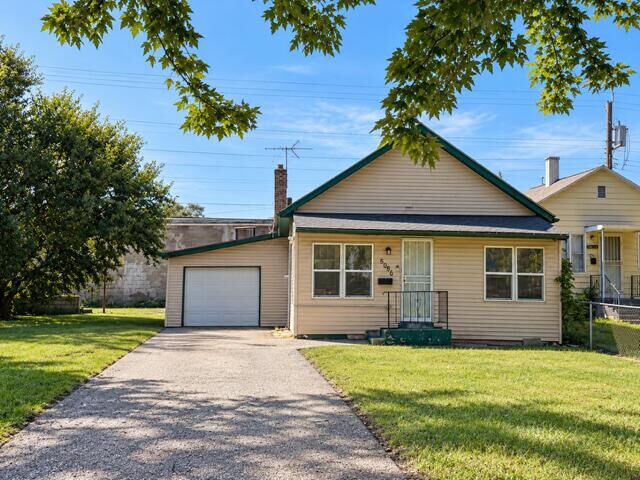 Property Photo:  5056 Massachusetts Street  IN 46409 