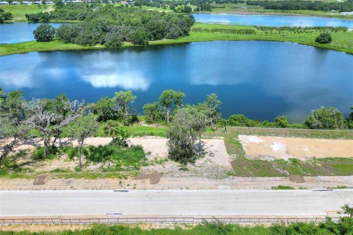 Property Photo:  177 Tranquil Mirror Lake Court Lot 5  FL 34711 
