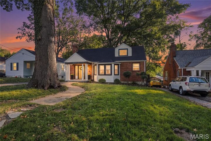 Property Photo:  216 S Hartnett Avenue  MO 63135 