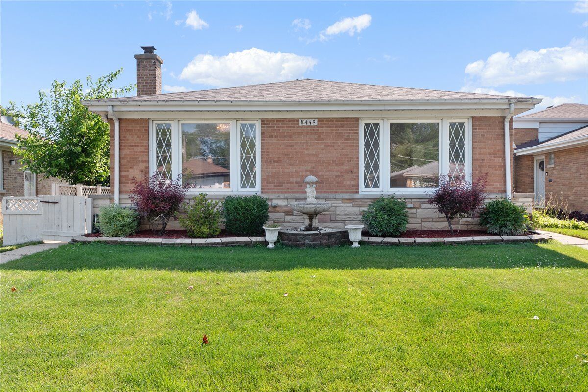 Property Photo:  8449 N St. Louis Avenue  IL 60076 