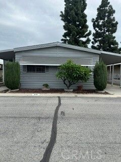 Property Photo:  8509 94 Beverly Blvd.  CA 90660 