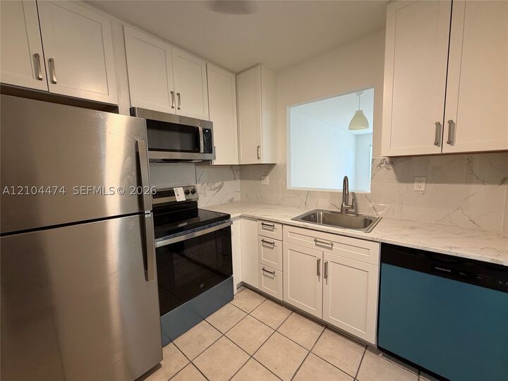 Property Photo: 5001 W Oakland Park Blvd 305 FL 33313