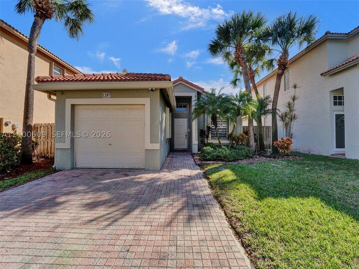 Property Photo: 1287 NW 170th Ter FL 33028