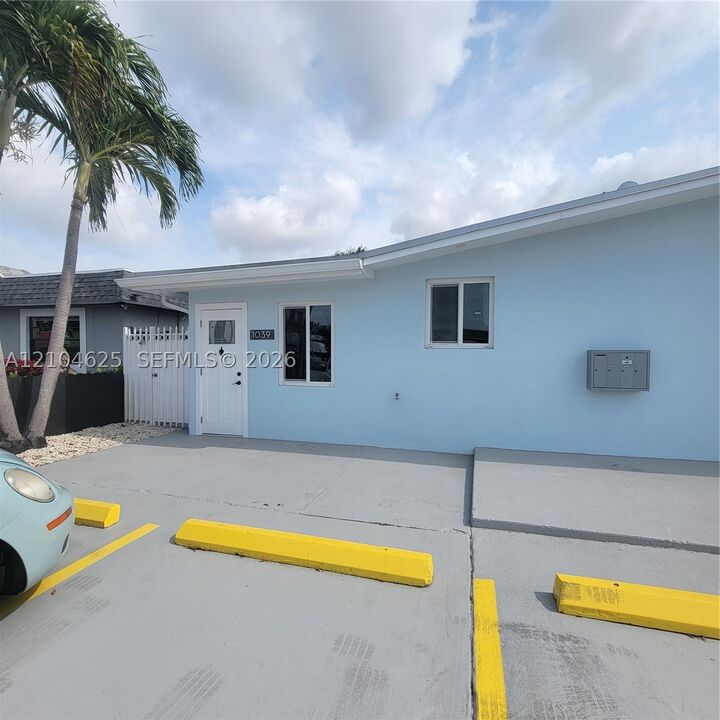 Property Photo: 1039 W 23rd St Front FL 33010