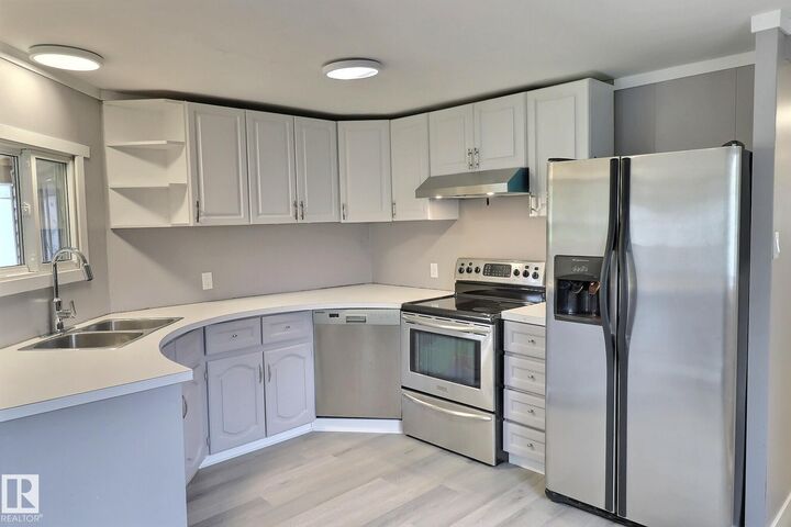 Property Photo:  542 Evergreen Park NW  AB T5Y 4M2 