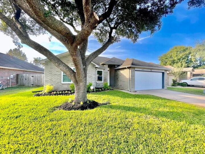 Property Photo:  6935 Creek Village Drive  TX 77449 
