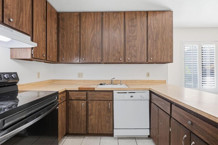 Property Photo:  2202 Woodside Lane 4  CA 95825 