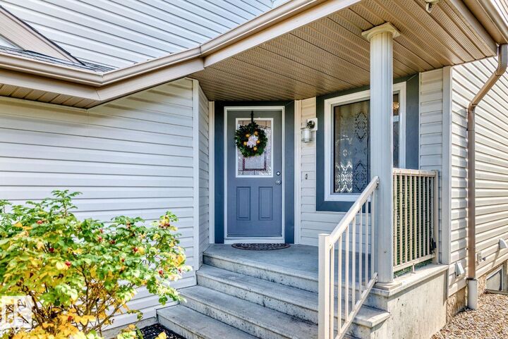 Property Photo:  6936 Strom Lane NW  AB T6R 0J9 