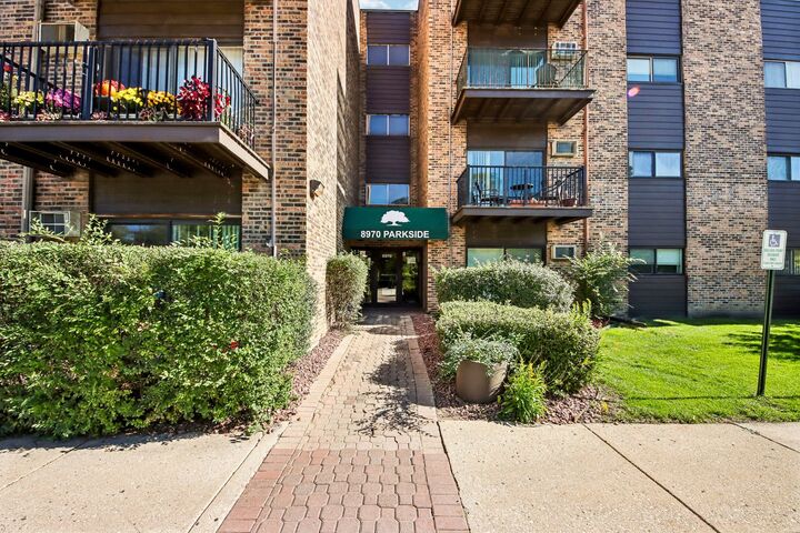 Property Photo: 8970 N Parkside Avenue 304 IL 60016