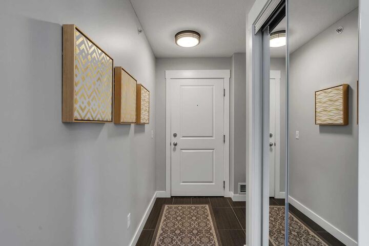 Property Photo:  11 Mahogany Row SE 1410  AB T3M 2L6 