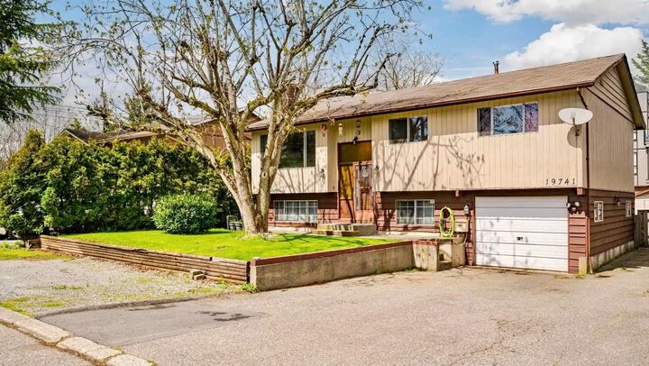 Property Photo:  19741 54A Avenue Main  BC V3A 3W4 