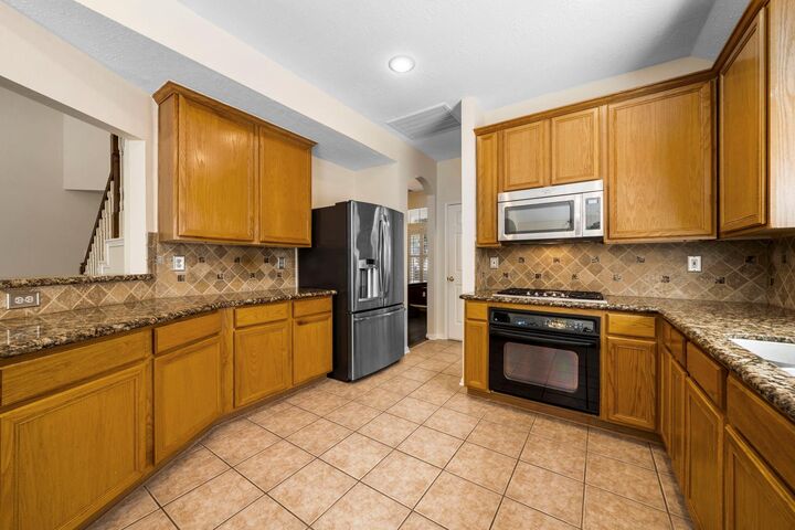 Property Photo: 78 E Hobbit Glen Drive TX 77384