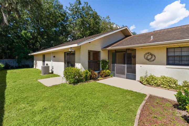 Property Photo:  1522 S Pointe Drive  FL 34748 