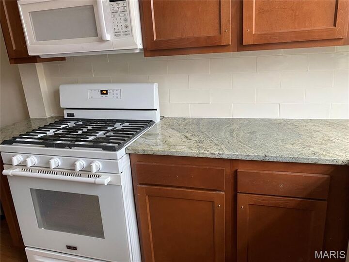 Property Photo:  900 Purdue Avenue 2S  MO 63130 