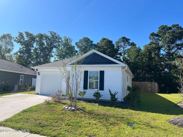Property Photo:  115 Cleat Drive  NC 28445 