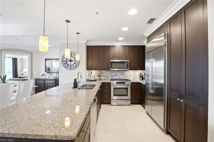 Property Photo:  9115 Strada Pl 5205  FL 34108 