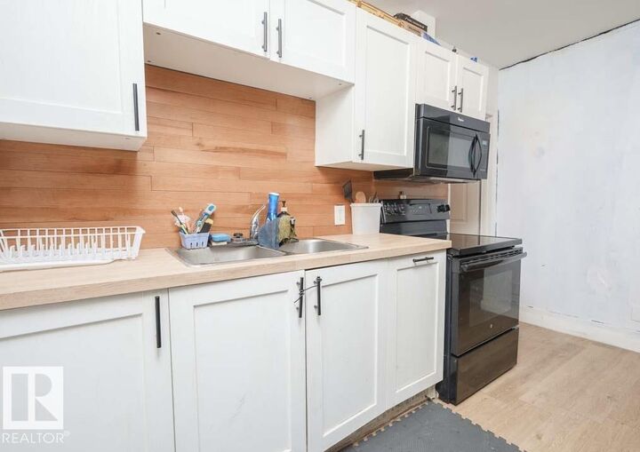 Property Photo: 11308 94 Street NW AB T5G 1H3