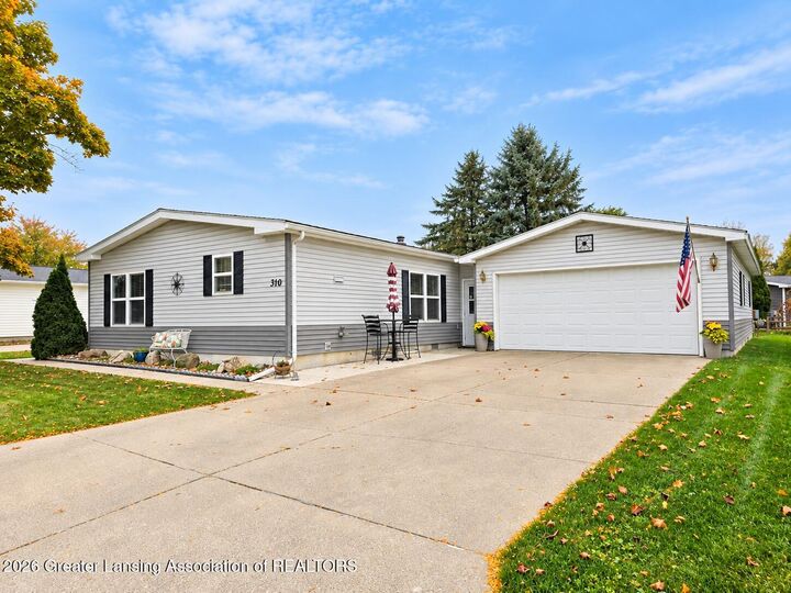 Property Photo:  310 Banberry  MI 48906 