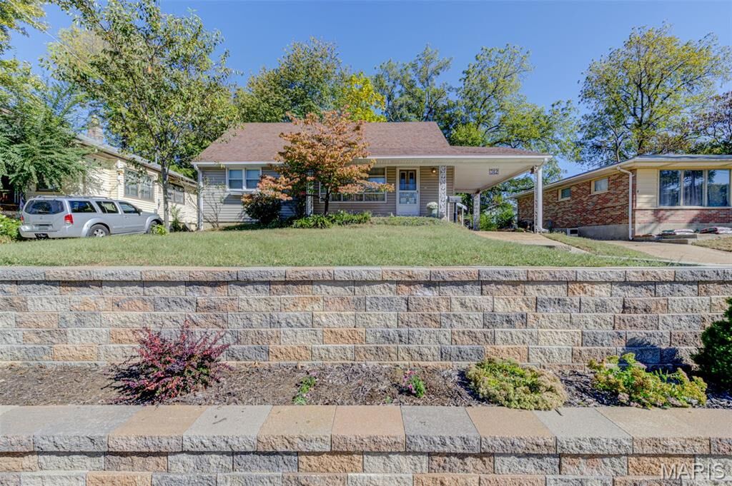 Property Photo:  312 Saint Louis Avenue  MO 63135 
