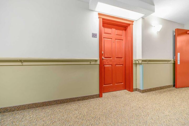 Property Photo:  1595 Southview Drive SE 218  AB T1B 0A1 