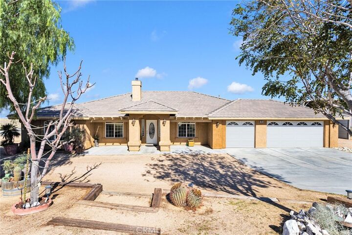 Property Photo:  26030 Roundup Way  CA 92308 