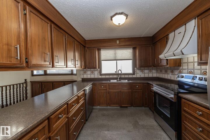 Property Photo:  18412 82 Avenue NW  AB T5T 3K4 