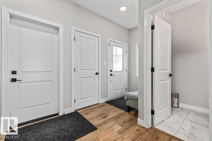 Property Photo:  7402 Chivers Crescent SW  AB T6W 4M2 