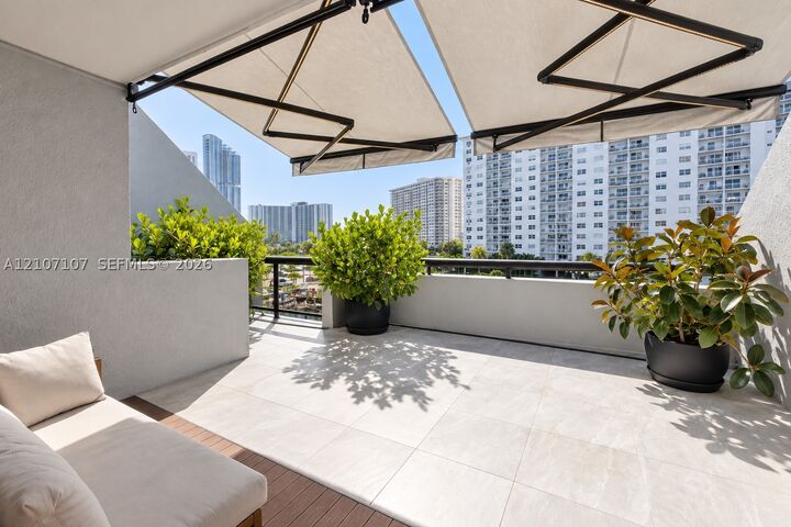 Property Photo:  416 Poinciana Dr 1722  FL 33160 