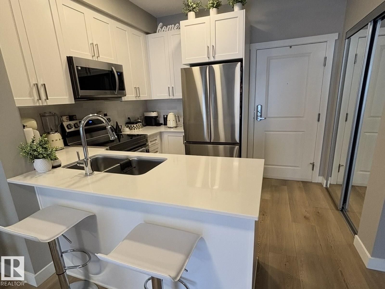 Property Photo:  12804 140 Avenue Avenue NW 318  AB T6V 0M3 