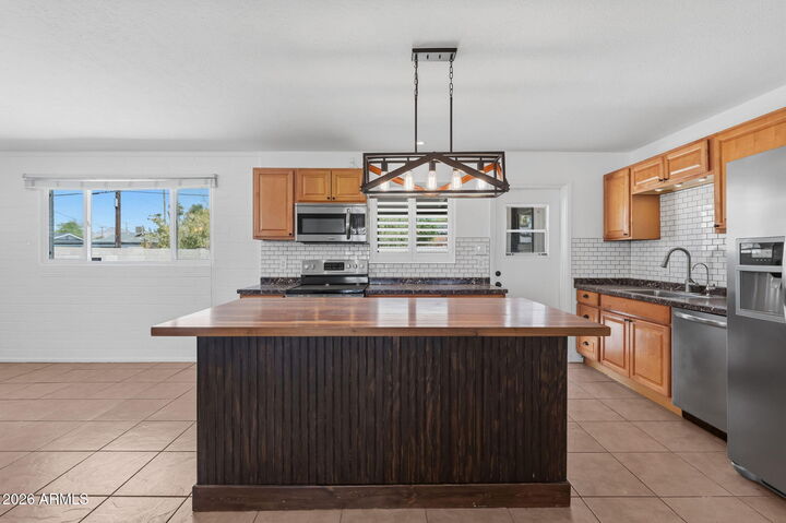 Property Photo:  7830 E Belleview Street  AZ 85257 