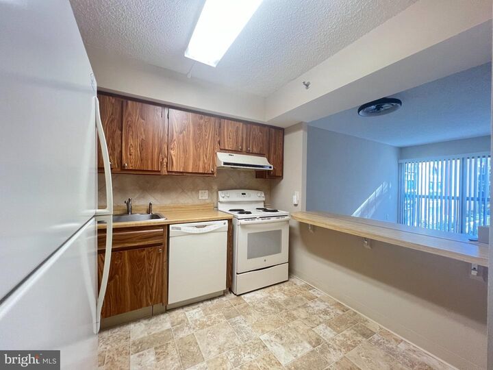 Property Photo: 2921 N Leisure World Boulevard 1-204 MD 20906