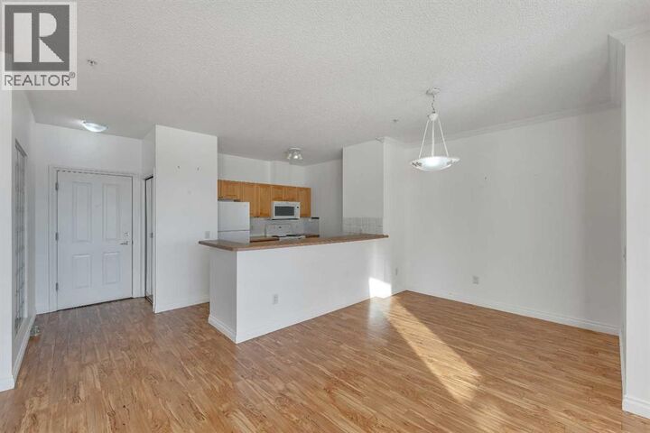 Property Photo: 1010 Arbour Lake Road Northwest AB T3G 4Y8