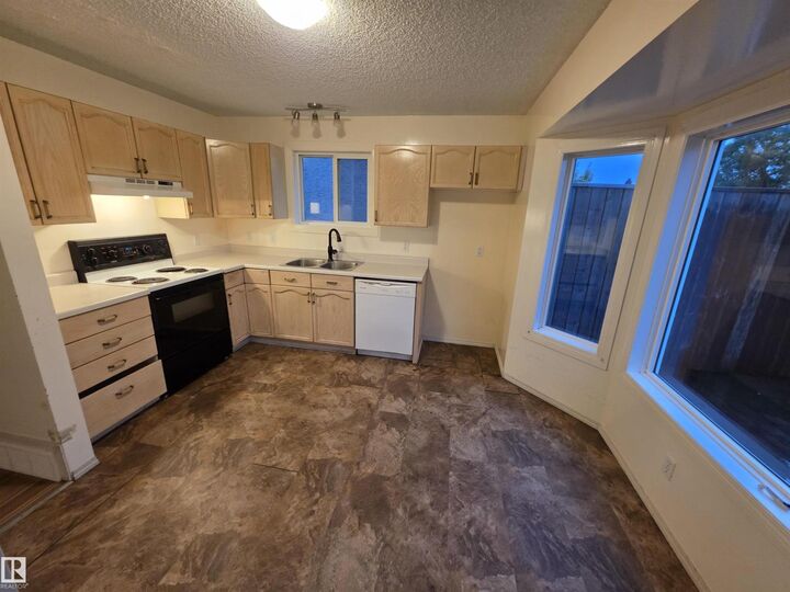 Property Photo:  #136 5 Aberdeen Wy  AB T7Z 1N1 