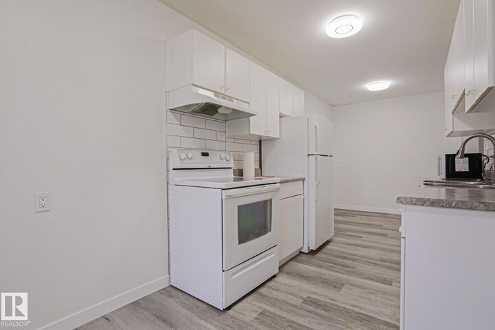 Property Photo: 238 Primrose Gardens Gardens NW AB T5T 0R1