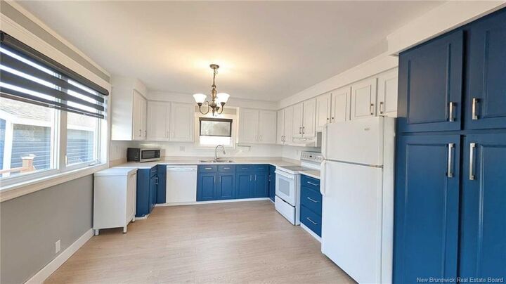 Property Photo: 30 All. Des Chenard NB E1W 1A5