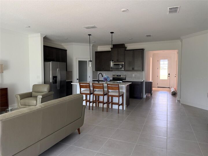 Property Photo:  2705 Sweet Acacia Drive  FL 34711 
