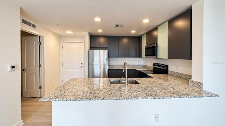 Property Photo:  5587 Millenia Boulevard 213  FL 32839 