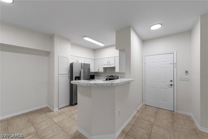 Property Photo:  23710 Walden Center Drive 304  FL 34134 