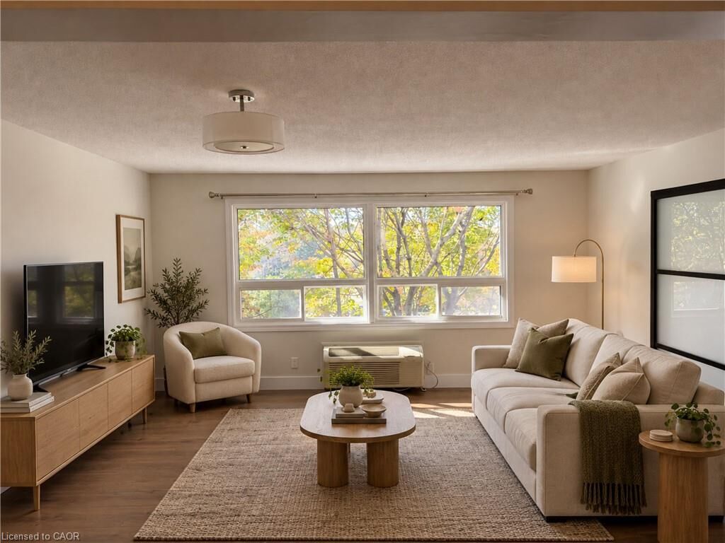 Property Photo: 30 Hugo Crescent 306 ON N2M 3Z2