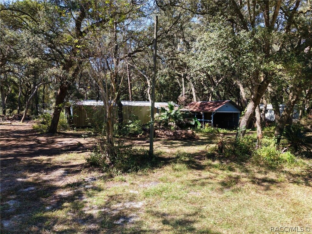 Property Photo:  12970 NW 87th Court  FL 32626 