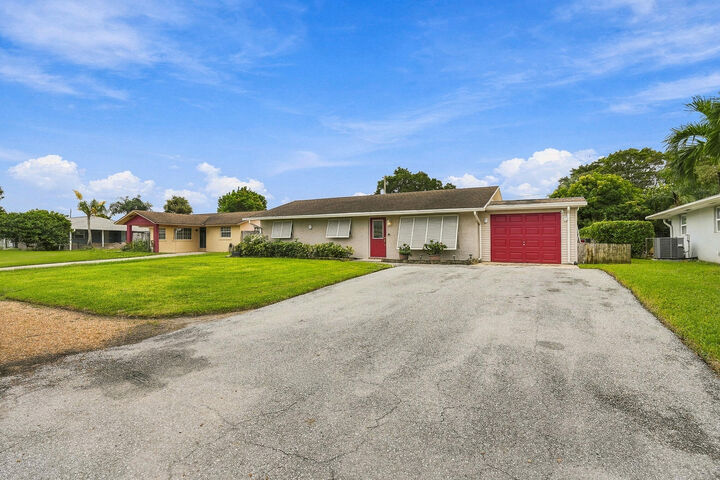 Property Photo:  4400 Crestdale Street  FL 33410 
