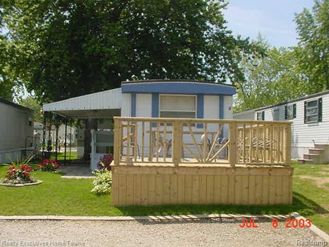 Property Photo: 5203 Main Street 108 MI 48450