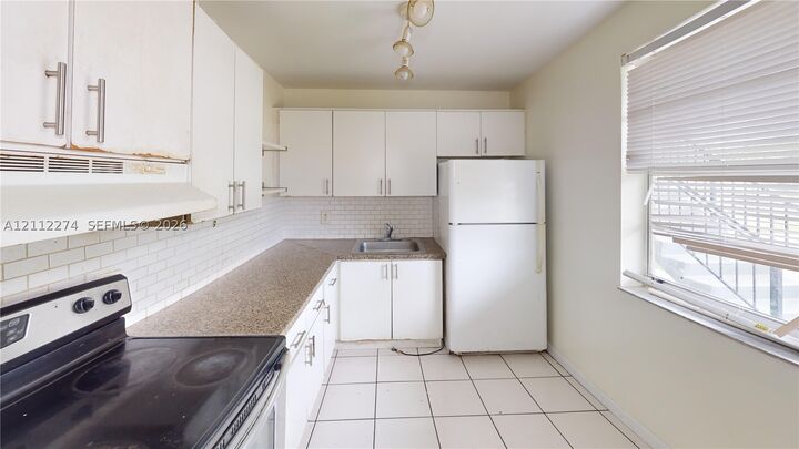 Property Photo:  301 NW 177th St 141  FL 33169 