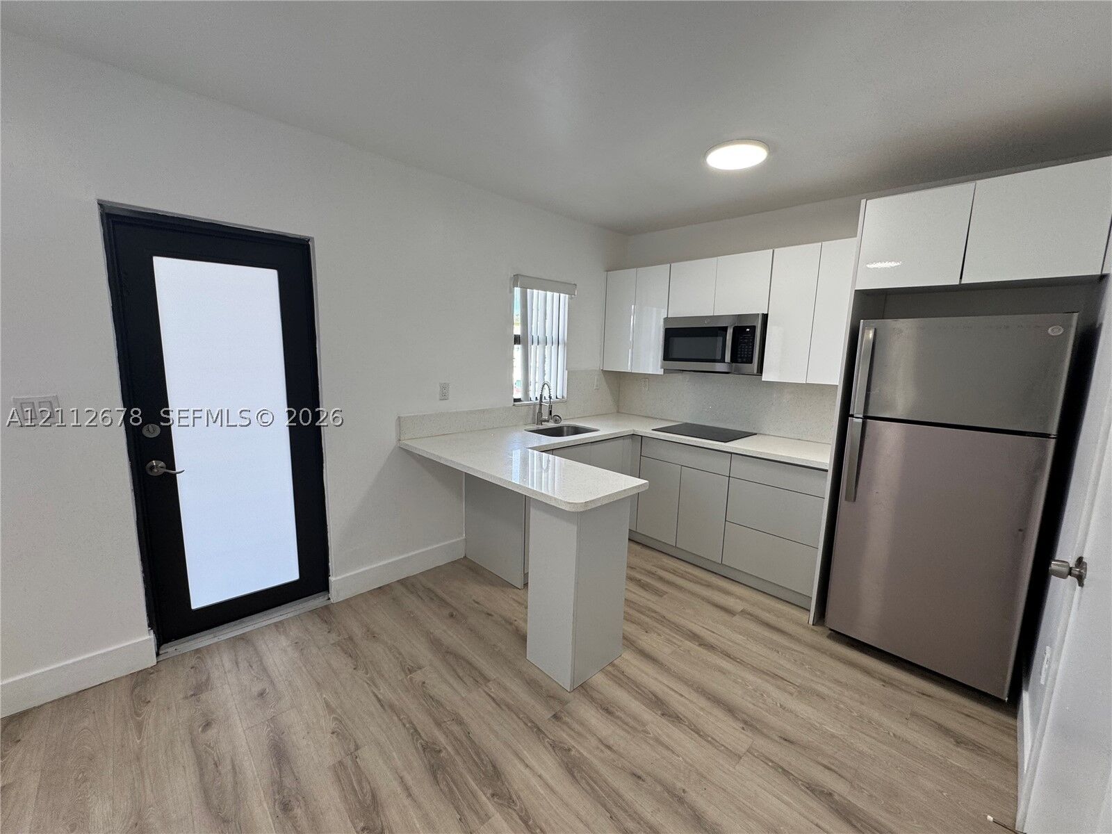 Property Photo: 1969 NW 2nd Ct 13 FL 33136