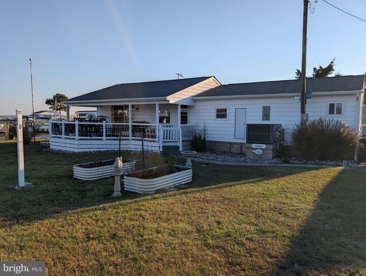 Property Photo: 35694 E Harbor Drive DE 19966
