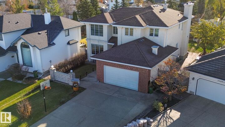 Property Photo:  11363 10 Avenue NW  AB T6J 6S9 