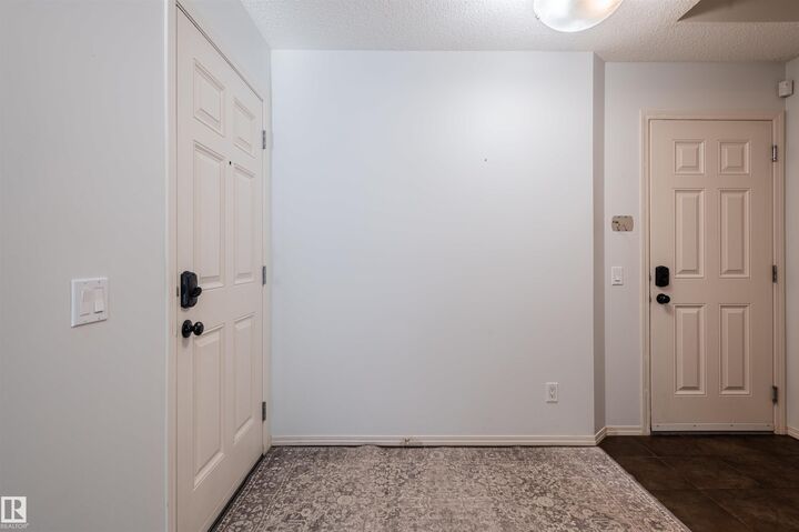 Property Photo:  21413 94 Avenue NW  AB T5T 4E5 